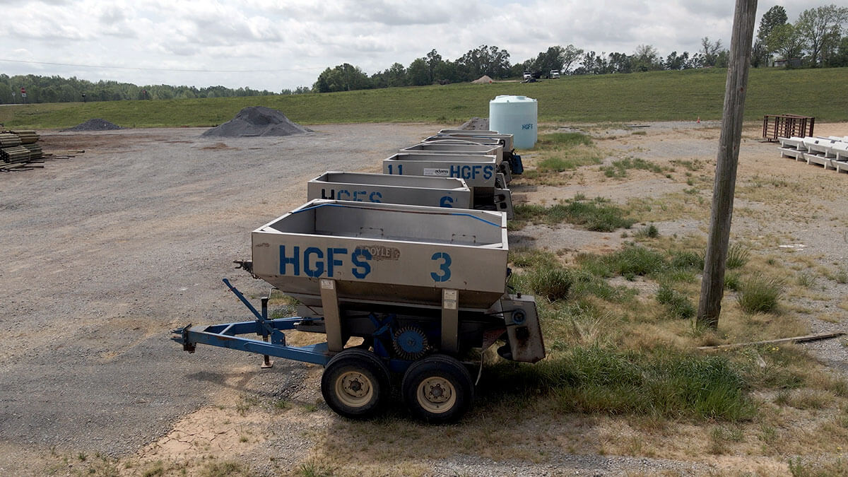 Open-front fertilizer bays at the Hi Grade yard